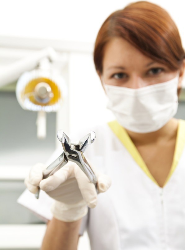 What different procedures can dentists use to remove wisdom teeth?