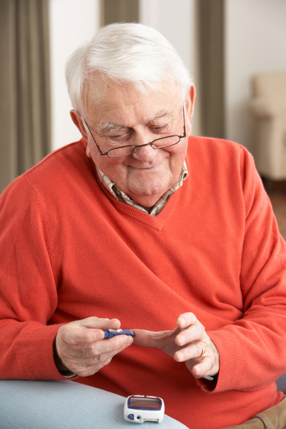 senior man checking insulin